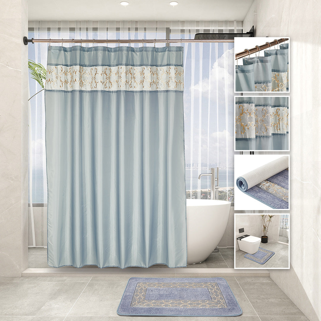 Grey 7-piece bathroom set with embroidered curtain, two non-slip rugs, towel trio, and hooks.